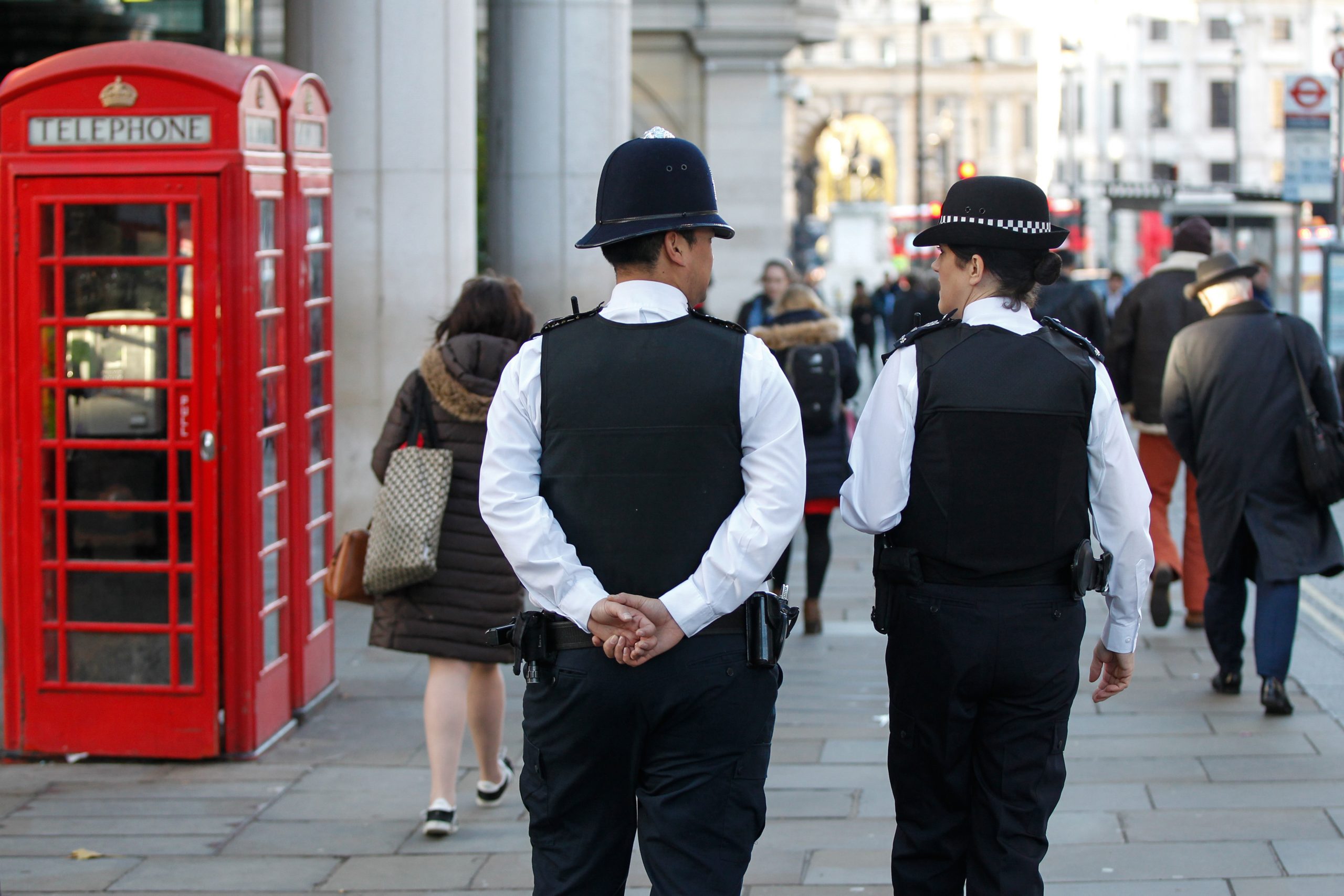 Westminster police officers patrol Whitehall